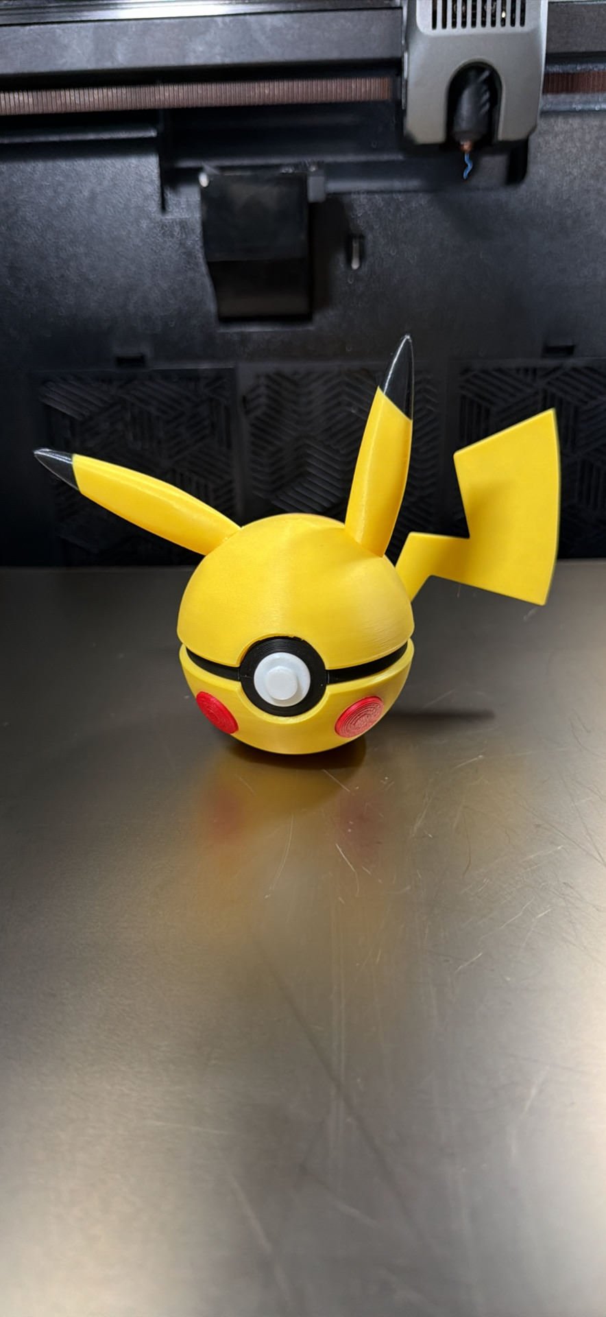 Yellow 3D printed character display ball with long ears and lightning tail by MHDesigns LLCYellow 3D printed character display ball with long ears and lightning tail by MHDesigns LLC
