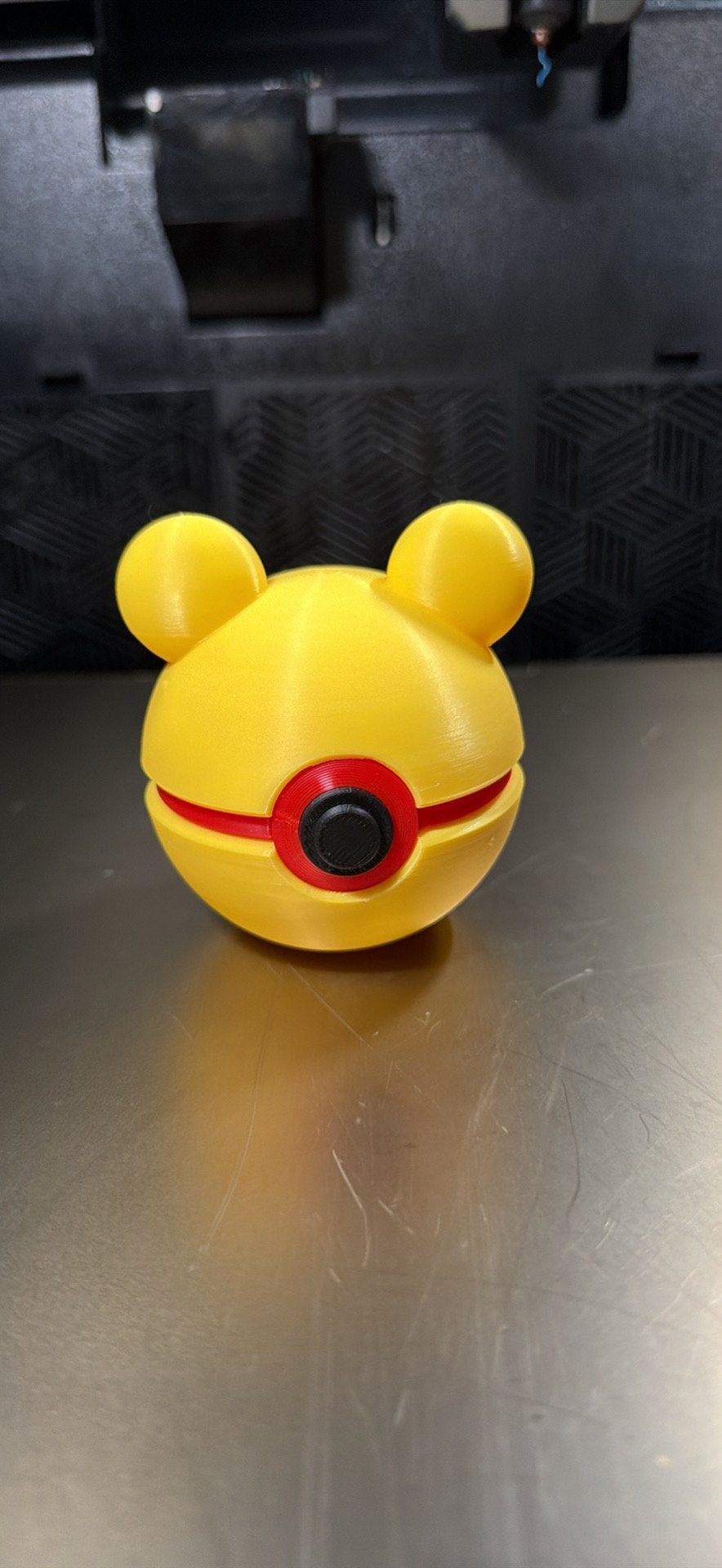 Yellow and red 3D printed bear character display ball with round ears by MHDesigns LLC